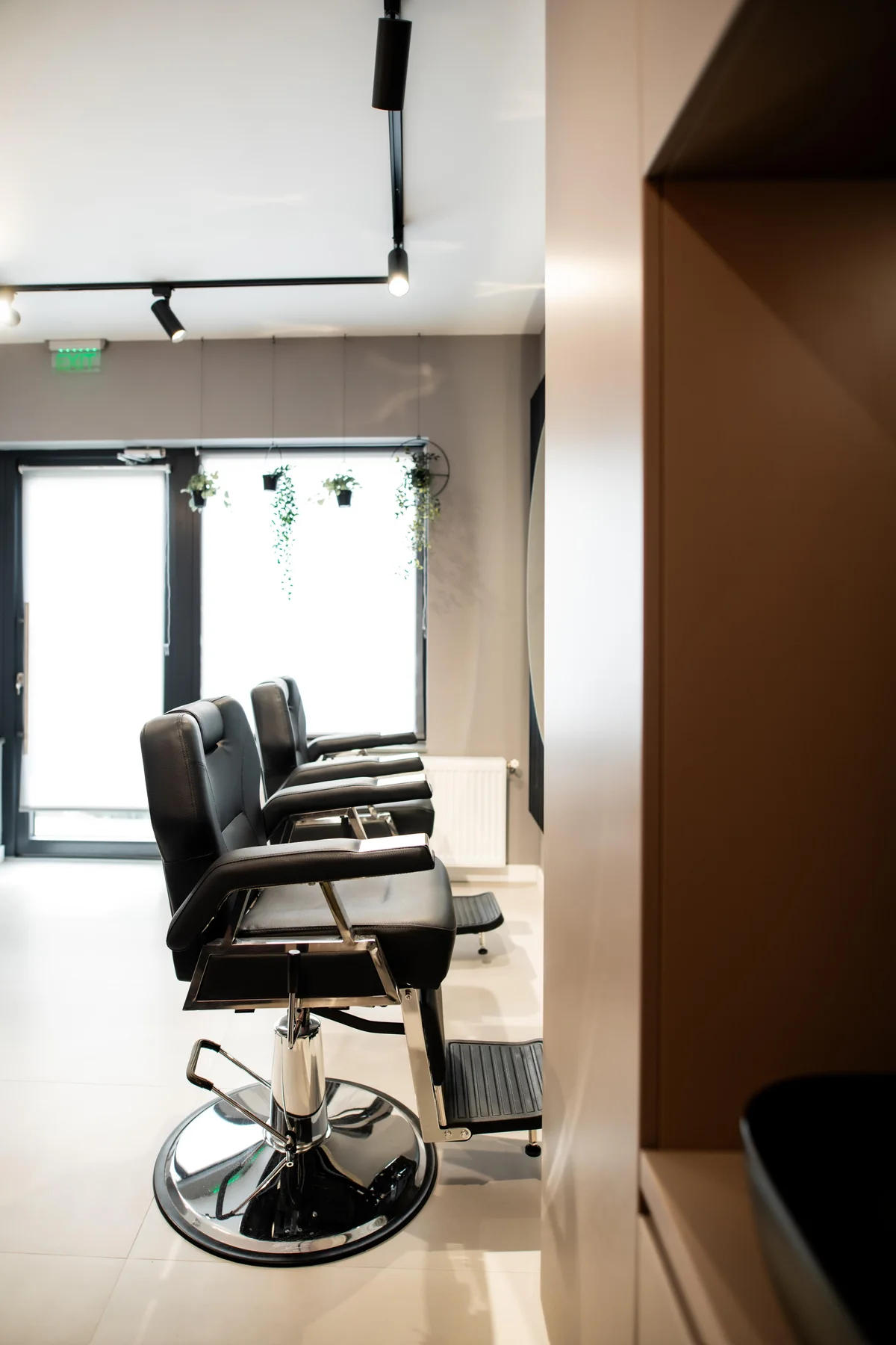 Beauty by AA — styling chairs under track lighting