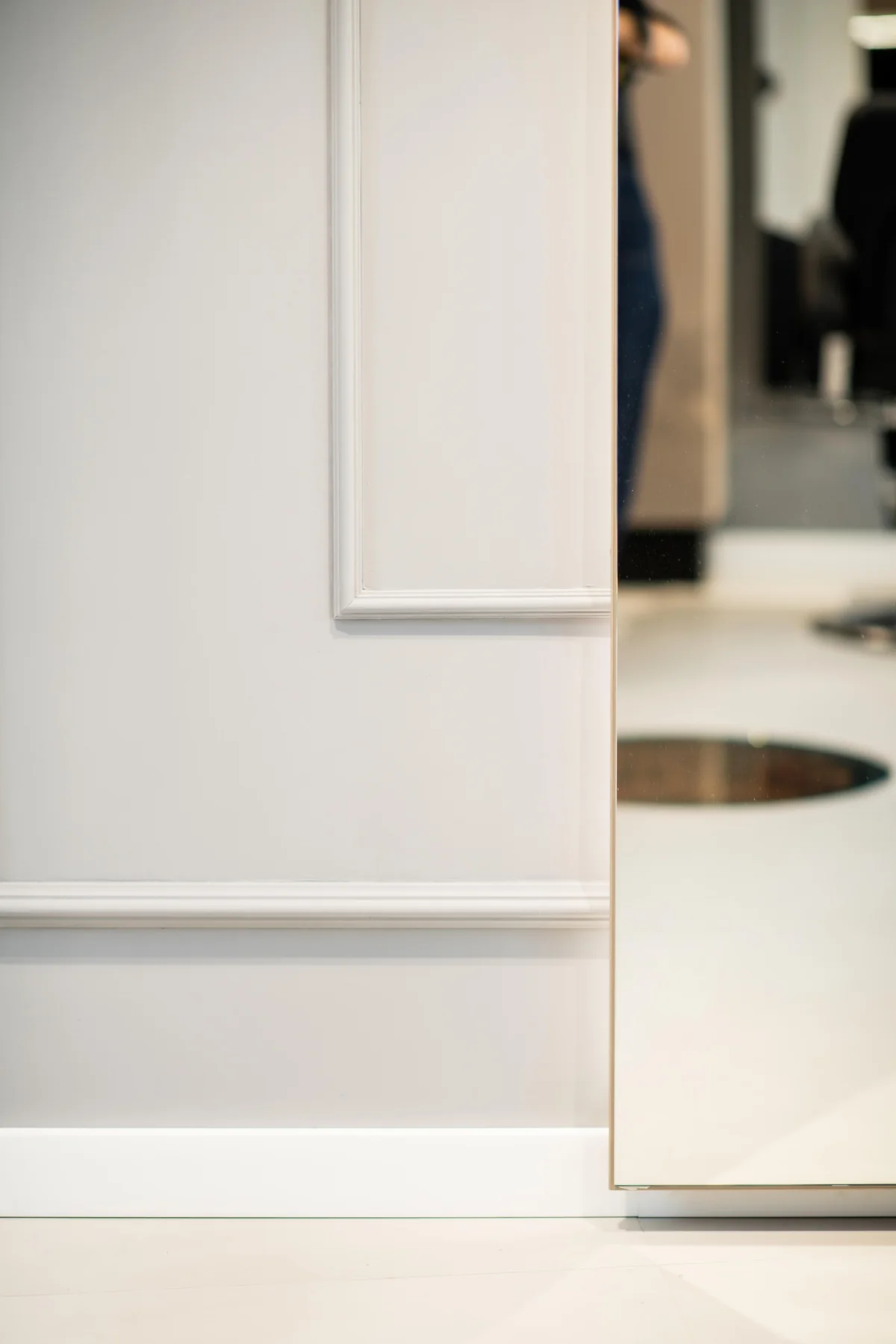 Beauty by AA — wall panelling and mirror reflection